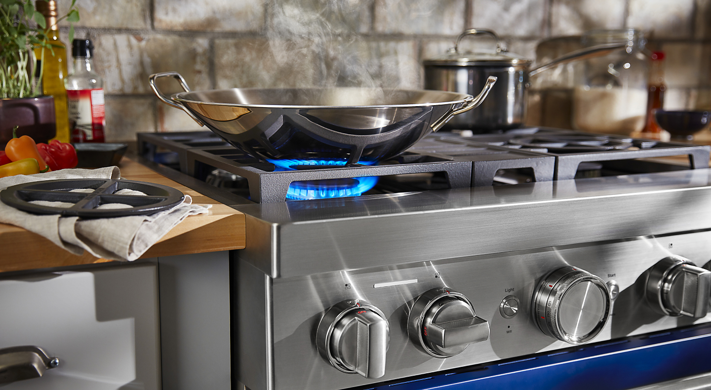 Wok heating on a KitchenAid® gas cooktop
