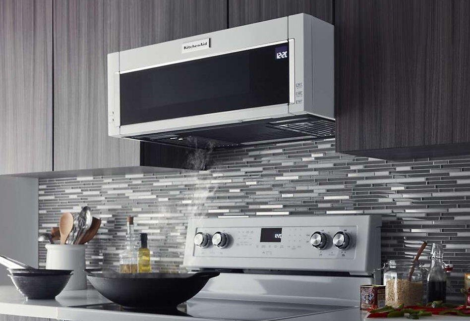 Low profile microwave hood with ample space below it