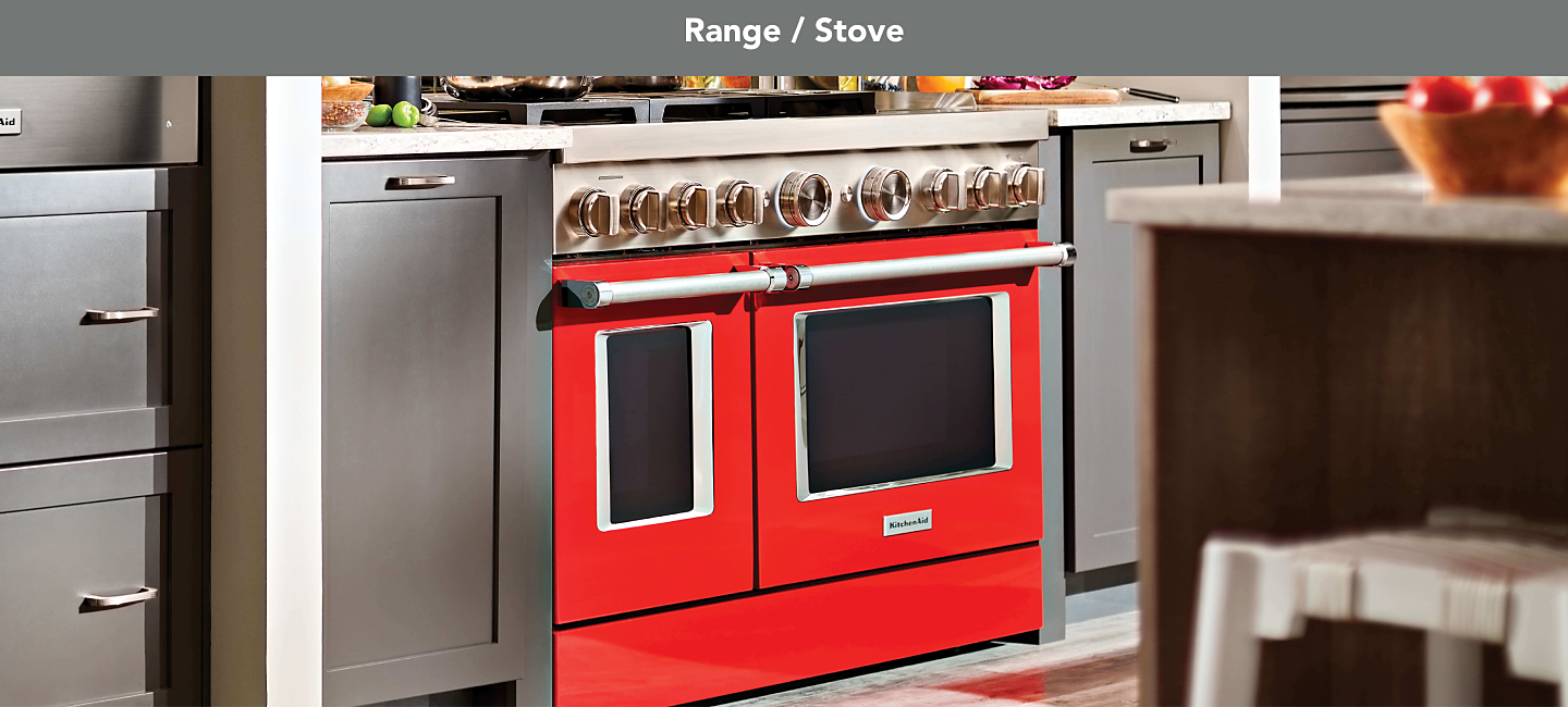 A red KitchenAid® range highlighted in a modern kitchen.