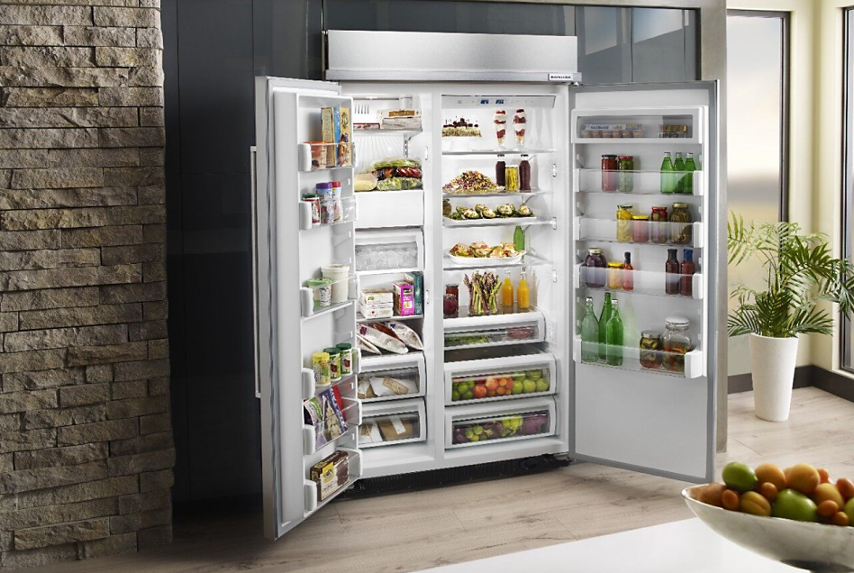 Built-in side-by-side refrigerator with its doors open 