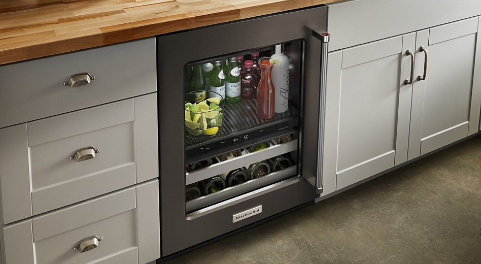 KitchenAid® Undercounter Refrigerator between cabinets 