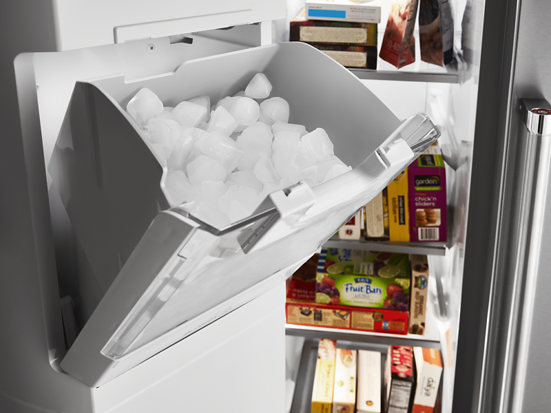 Full ice bin inside freezer door