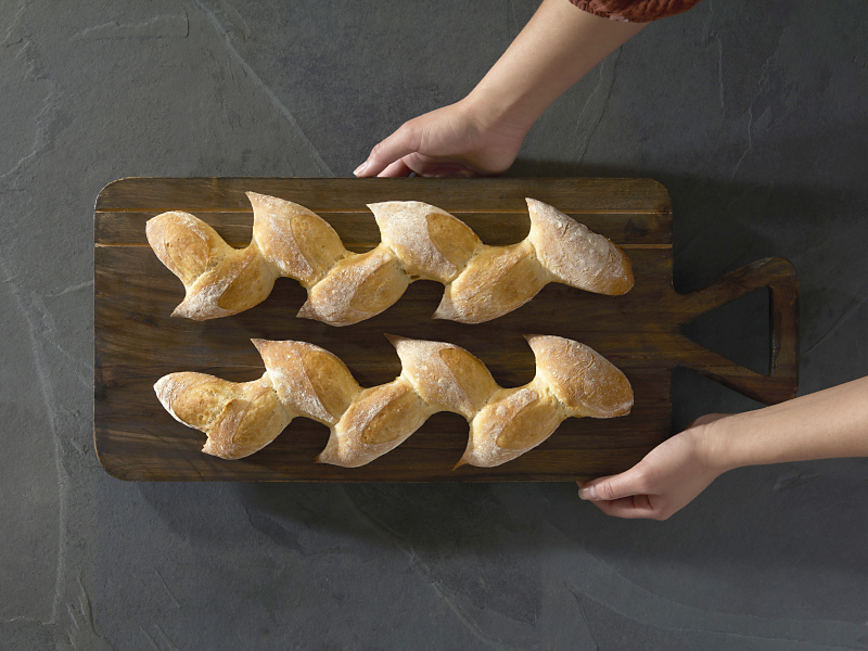 Homemade bread loaves in a wavy pattern