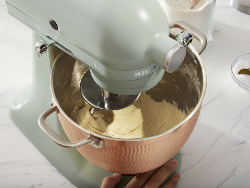 A stand mixer kneading dough