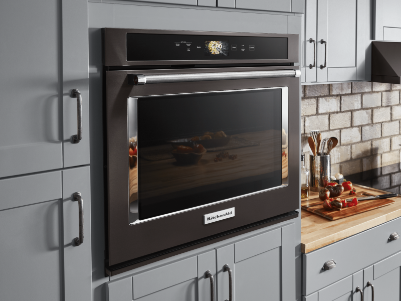 KitchenAid brand single wall oven in gray cabinetry