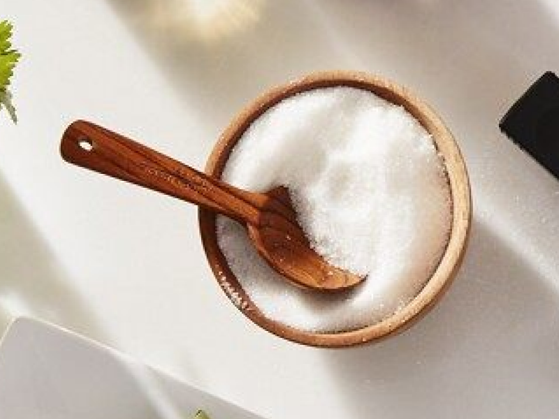 Wooden bowl filled with salt