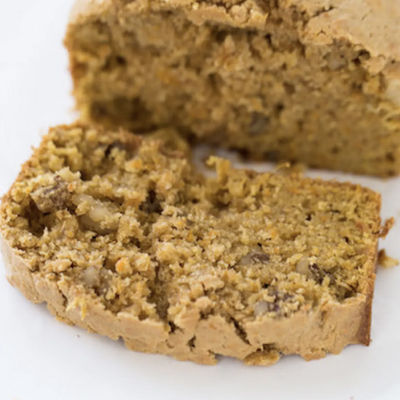 Slice of browned butter sweet potato bread with walnuts