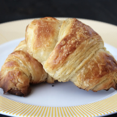 Croissants on a serving plate