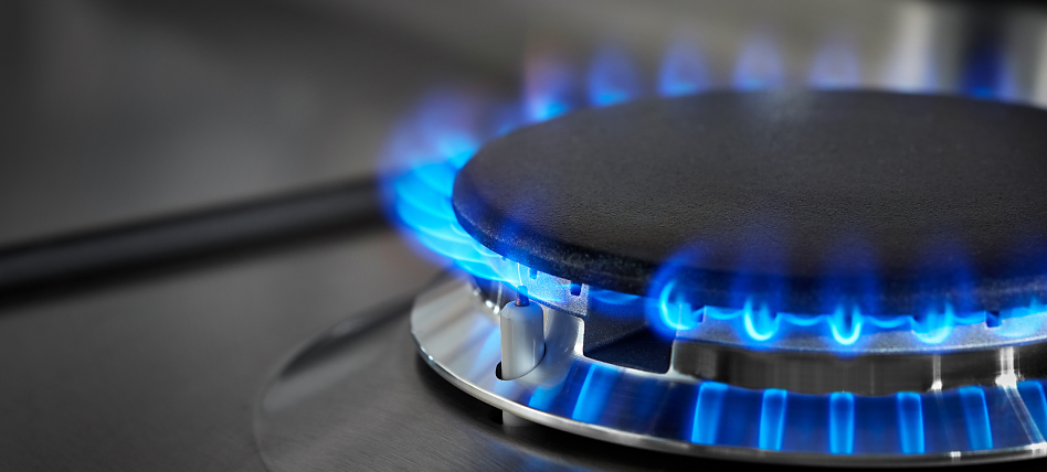 Blue flames ignited on a gas burner