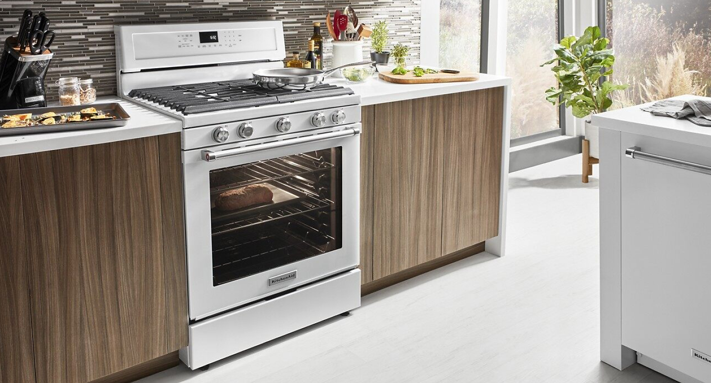 A stainless steel KitchenAid® freestanding gas range. A stainless steel KitchenAid® freestanding gas range.