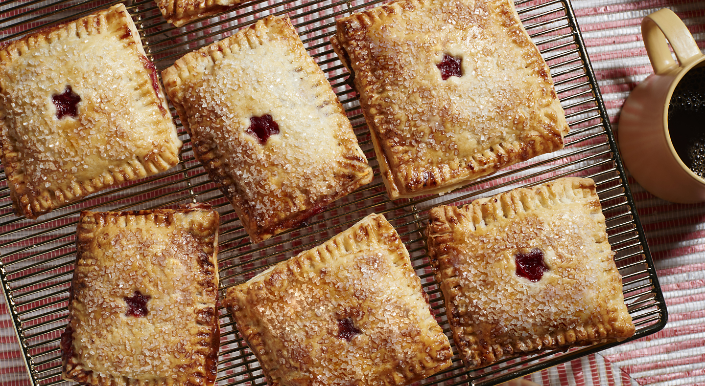 Air-fried strawberry hand pies on a baking rack