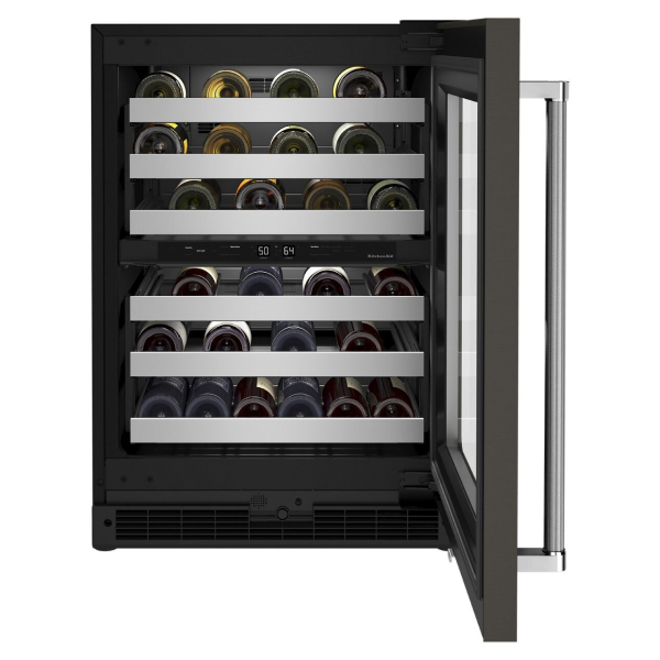 Open wine cellar style of refrigerator full of red and white wine