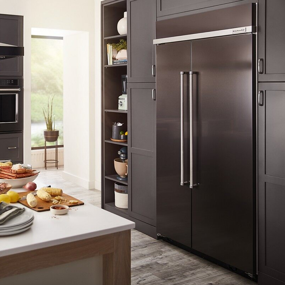 Black stainless refrigerator style in modern kitchen