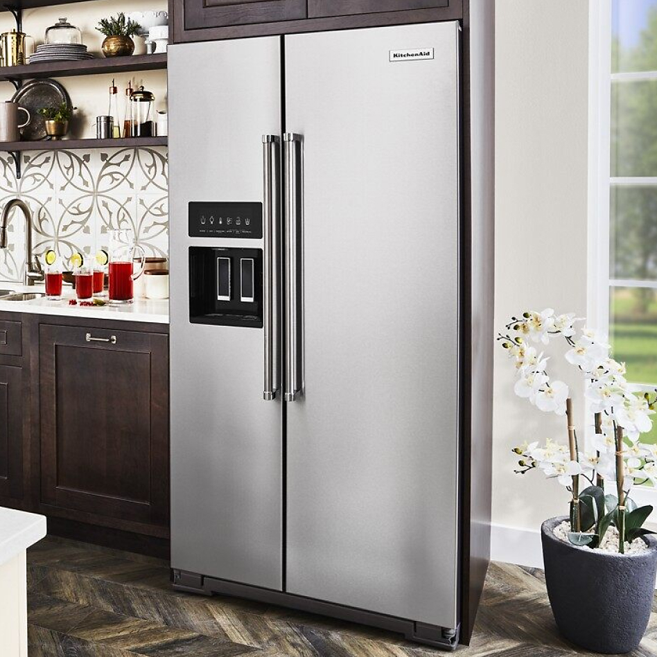 Stainless steel counter-depth refrigerator style in kitchen
