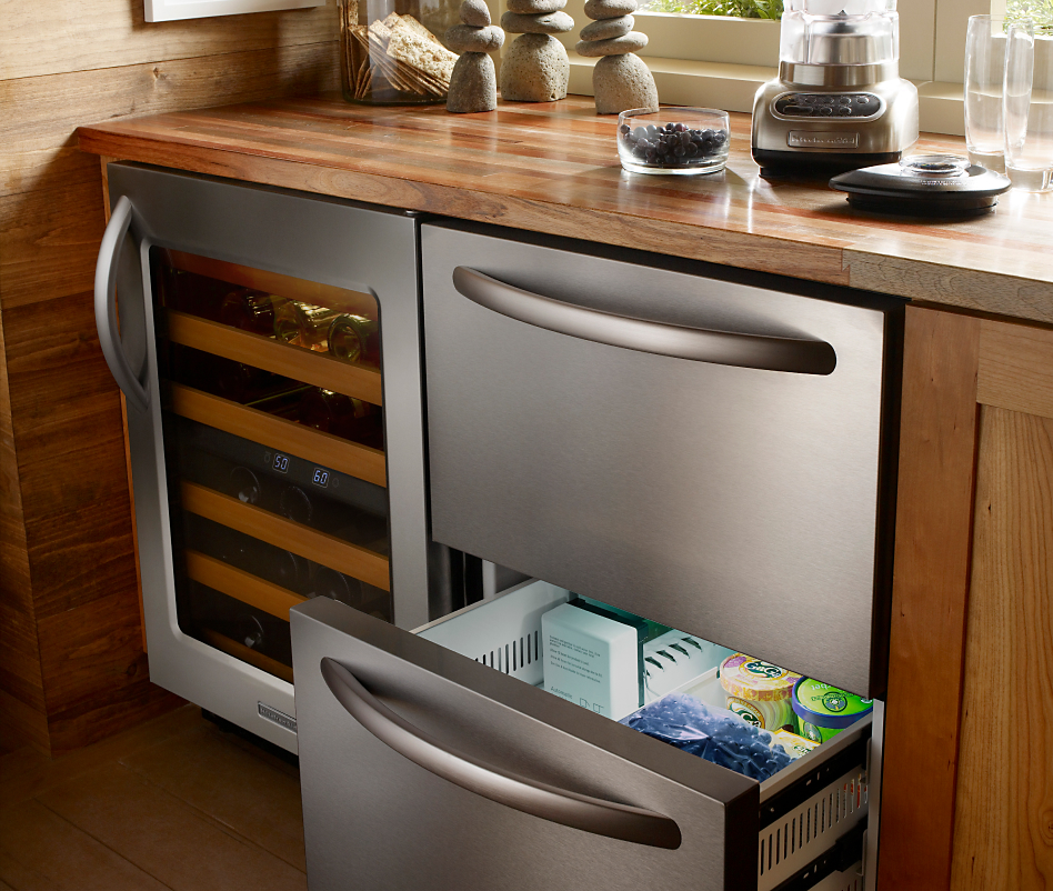 Stainless steel KitchenAid® wine refrigerator and undercounter refrigerator drawers