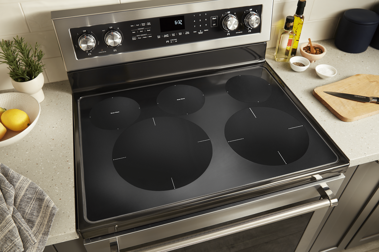 Birds-eye view of an electric stovetop with 5 cooking elements
