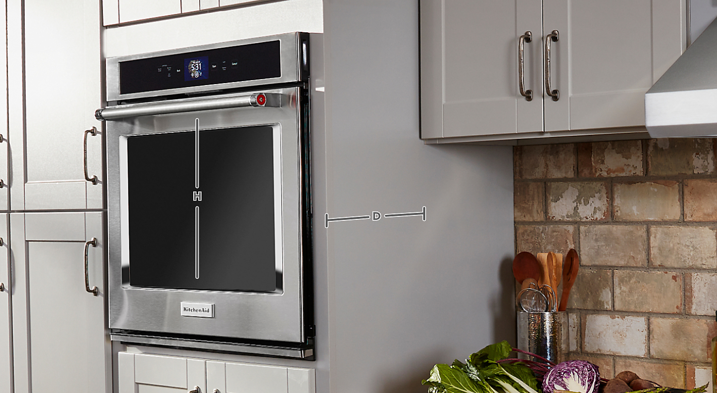 KitchenAid® Wall Oven in a kitchen with measurement lines