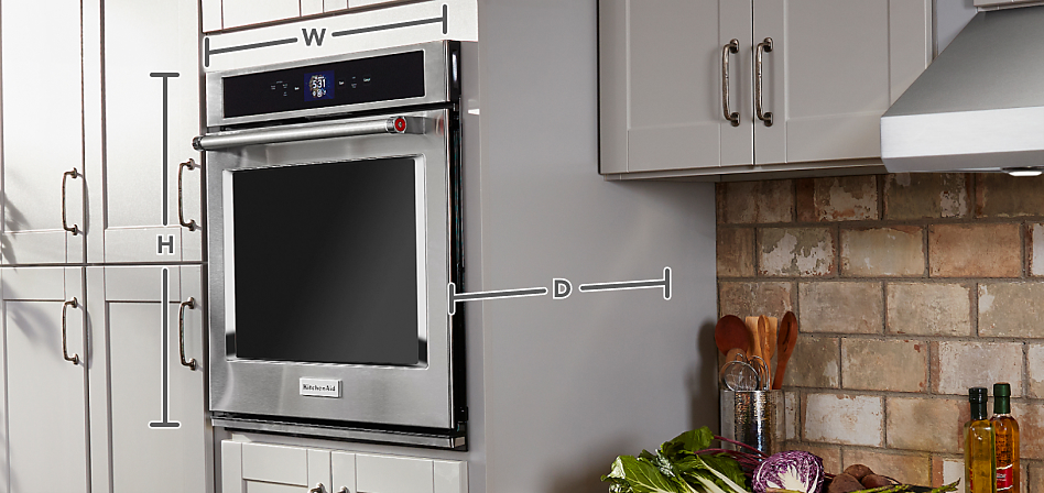 KitchenAid® Wall Oven in a kitchen with measurement lines
