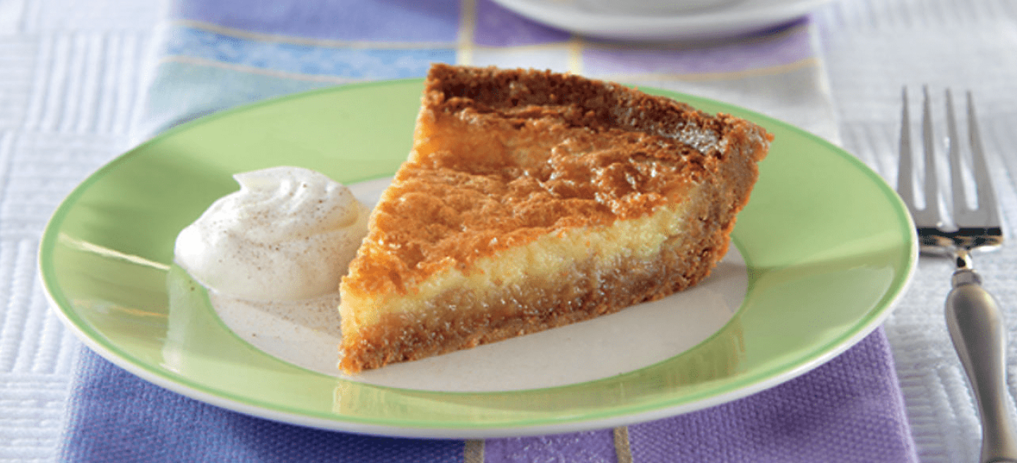 Slice of buttermilk pie on plate
