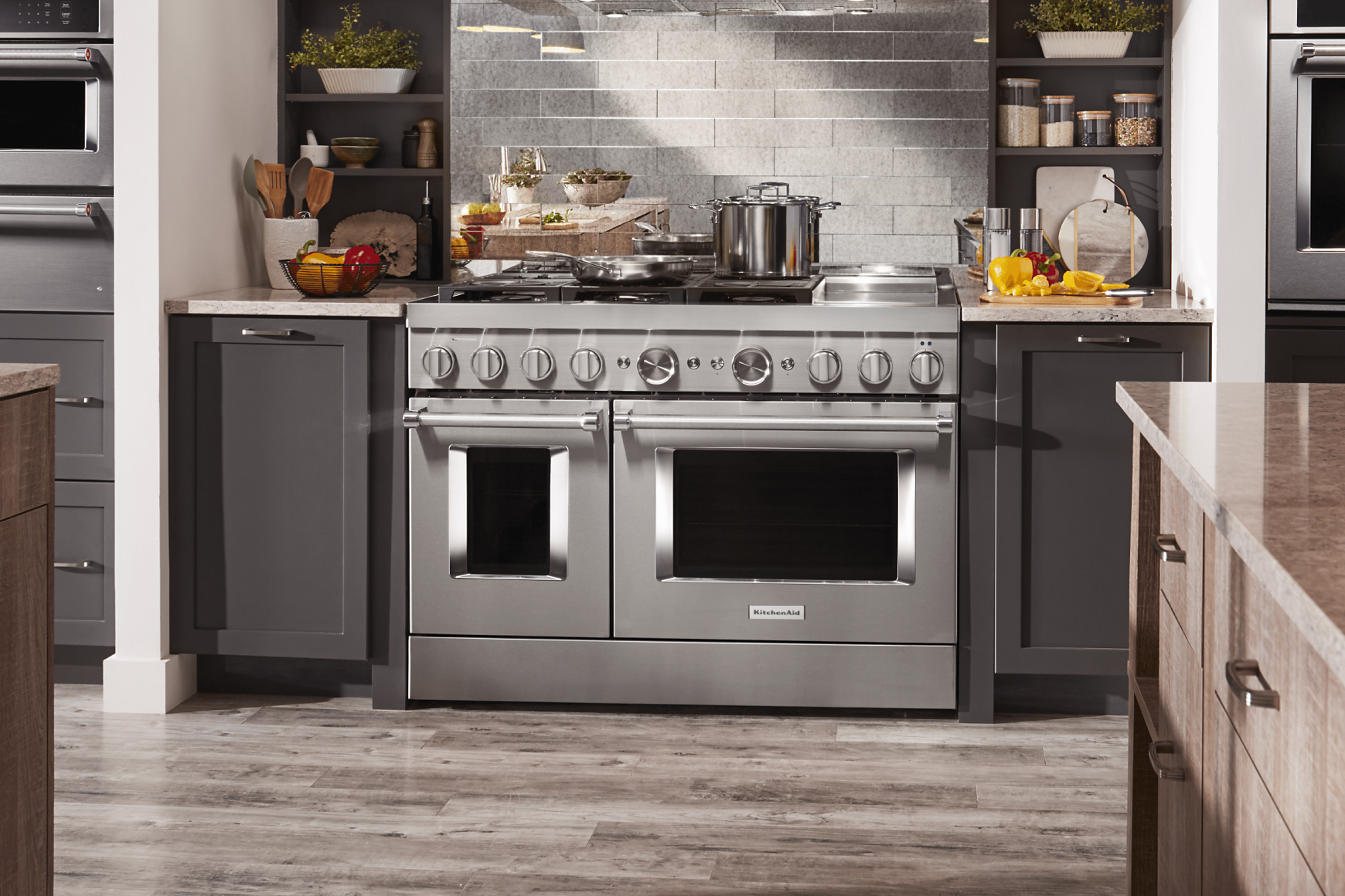 Stainless steel, double-oven commercial-style range in a kitchen