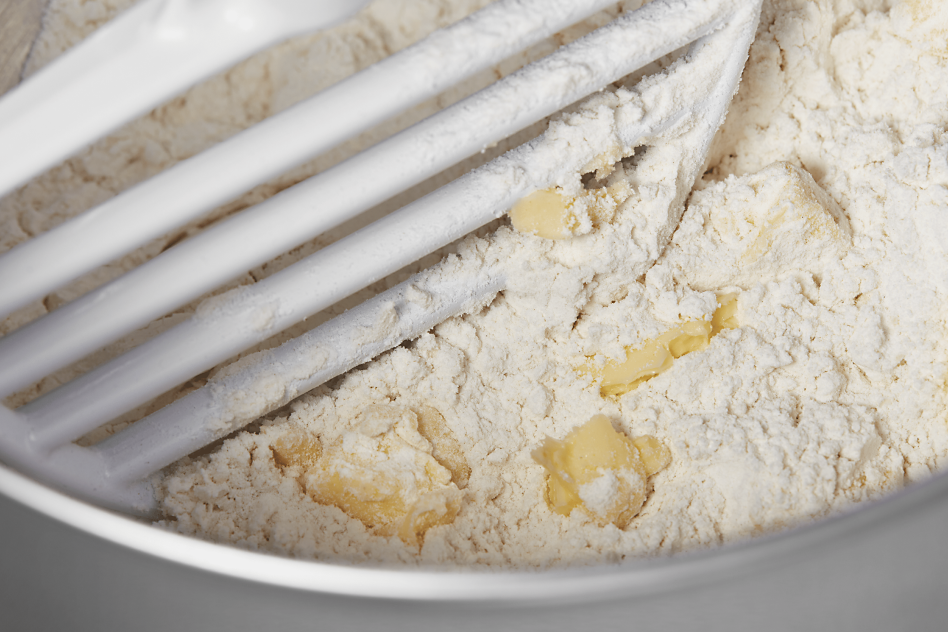KitchenAid®  Pastry Beater cutting butter into flour