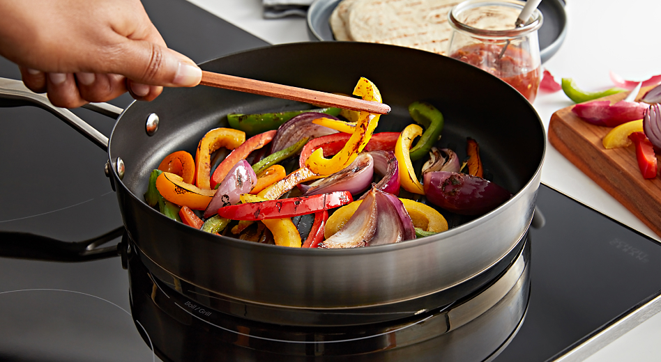 Veggies cooking on an induction cooktop