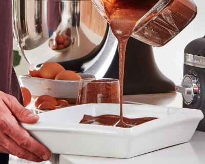 Pouring chocolate into a pan
