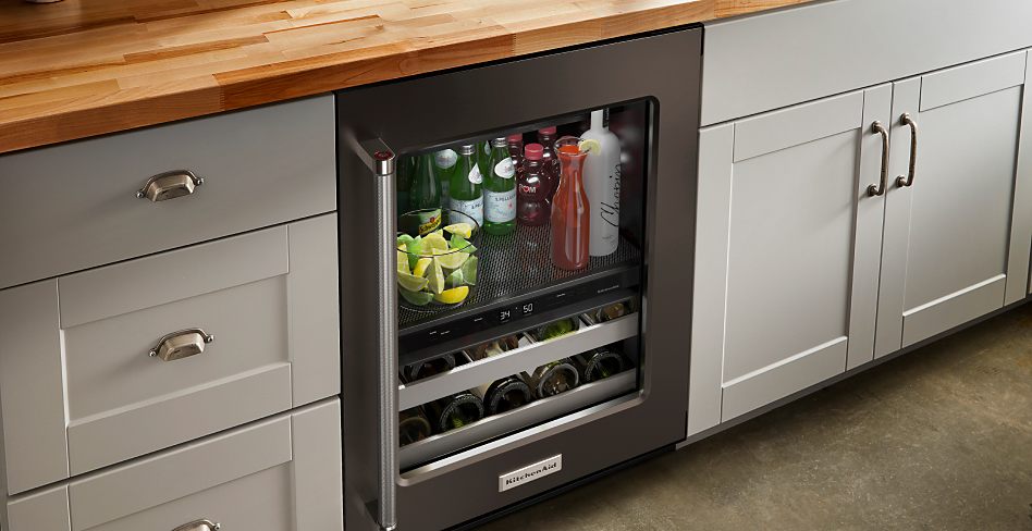 Beverage center with sparkling water, juice and limes inside