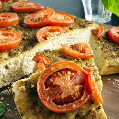 Focaccia topped with sliced tomatoes