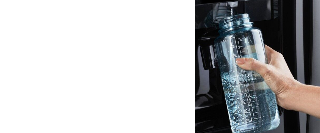A person refilling a reusable water bottle.