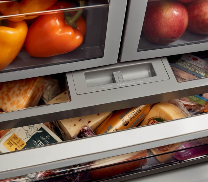 KitchenAid® French Door Bottom Mount Refrigerator FreshChill™ Temperature Controlled Drawer holding meats and cheeses.