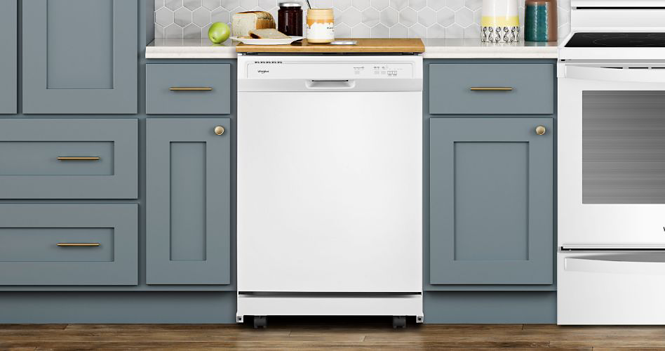 A Maytag dishwasher between grey cabinets and drawers and a Maytag oven. 