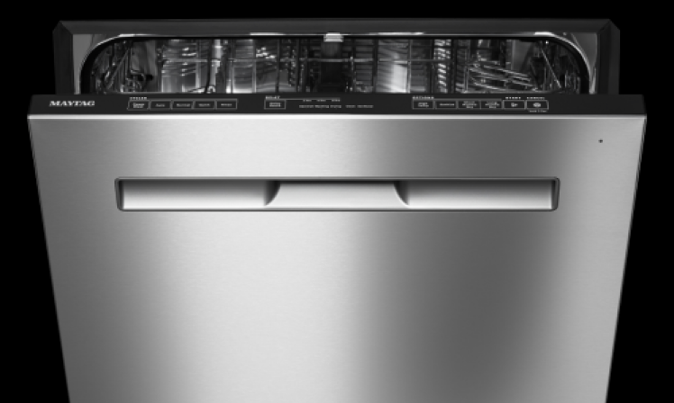 A Maytag® dishwasher with the door slightly open