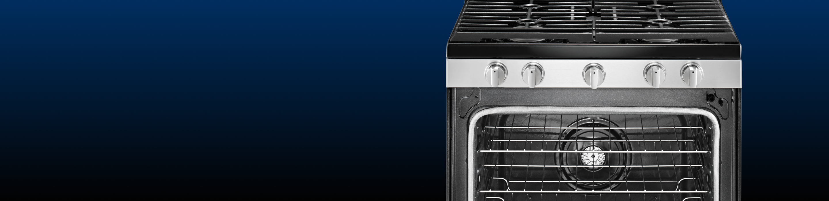 A Maytag kitchen range with its door open.