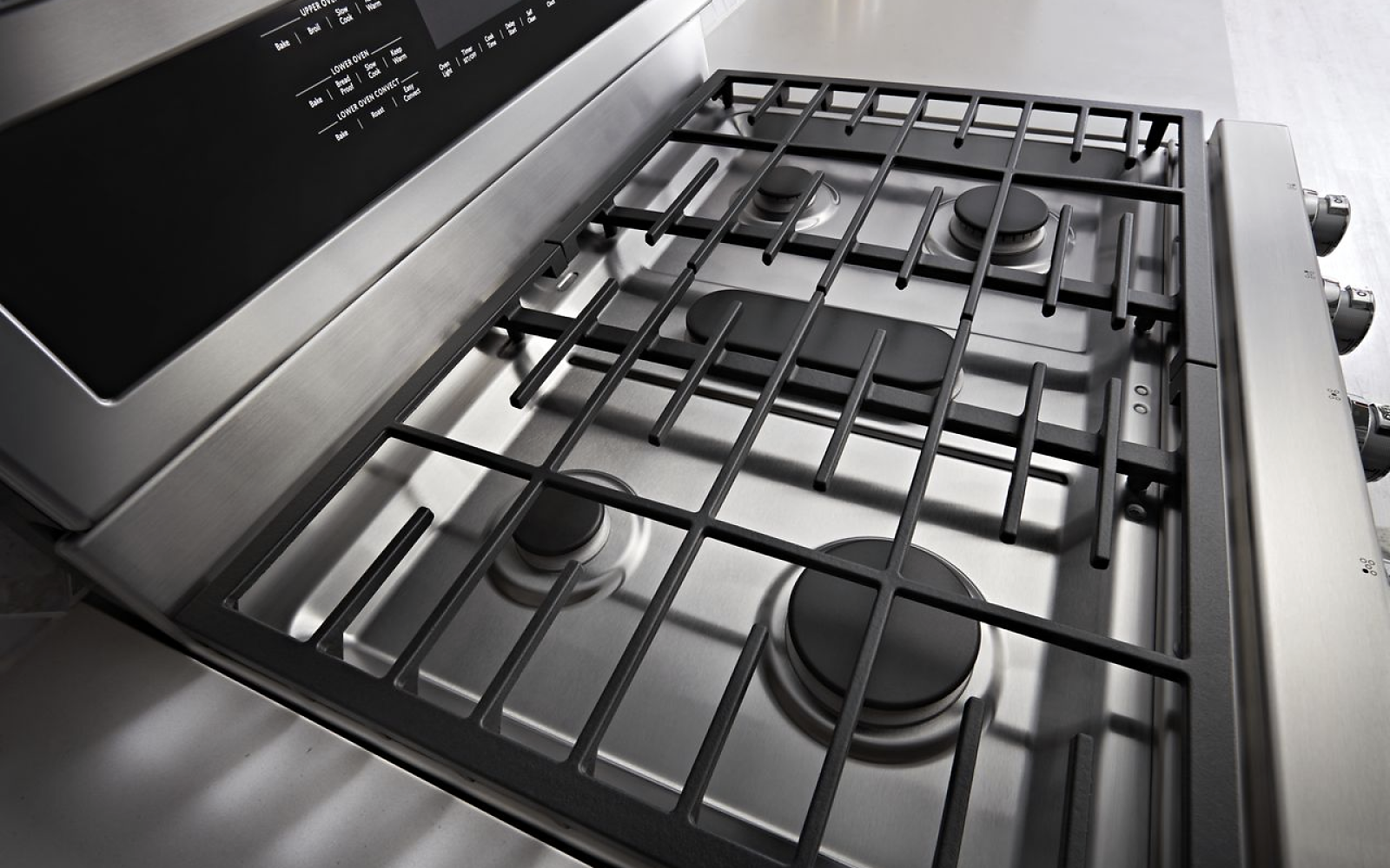 An image of a stainless steel gas cooktop.