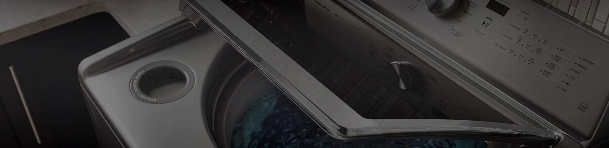 Maytag® top-load washing machine filled with water.