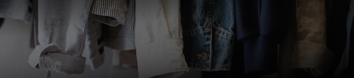 Close-up of several shirt sleeves.
