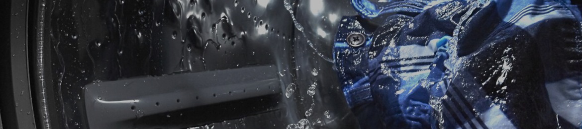 Internal view of a Maytag® washing machine washing clothes.