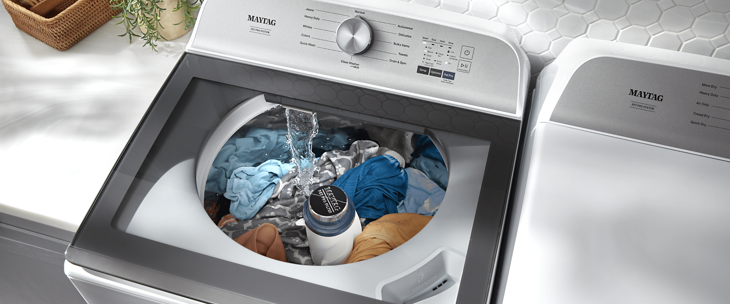 Clothes washing inside a Maytag® top load washer