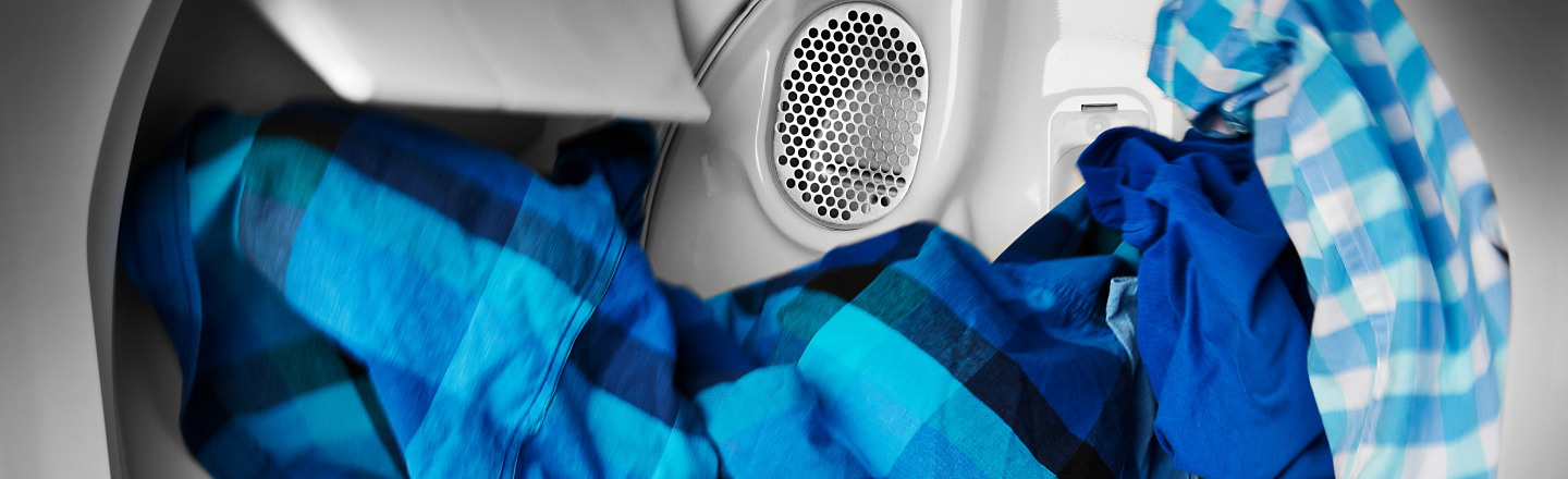 Clothes tumbling in a Maytag® dryer