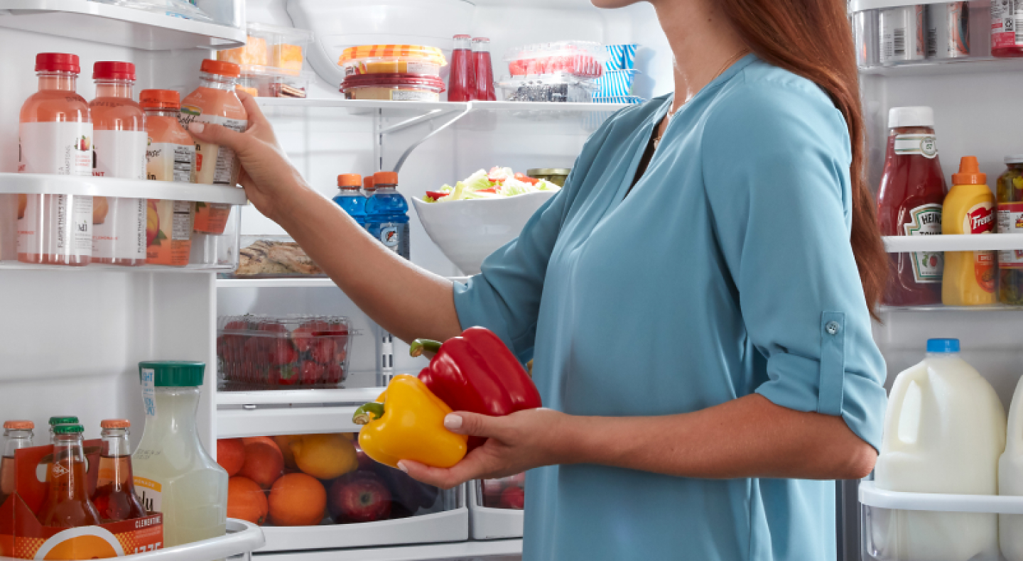 Removing items from a fully stocked refrigerator