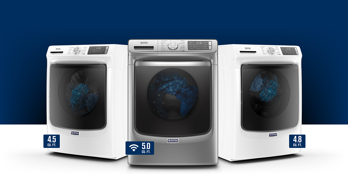 View of three heavy duty Maytag washers in stainless steel