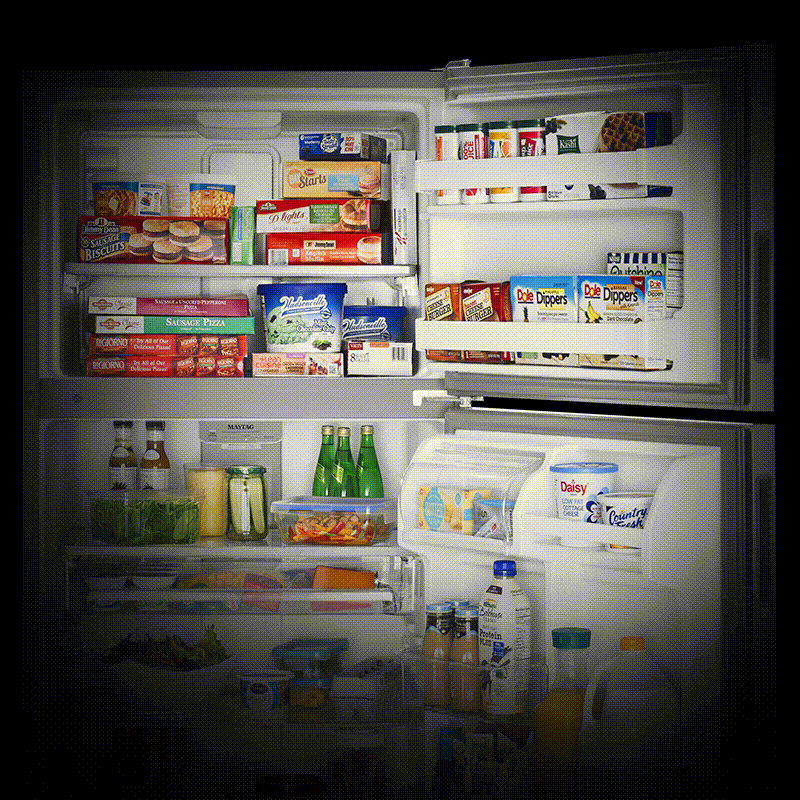 A GIF of an open and closed Maytag® refrigerator with a Good Housekeeping badge in front of it.