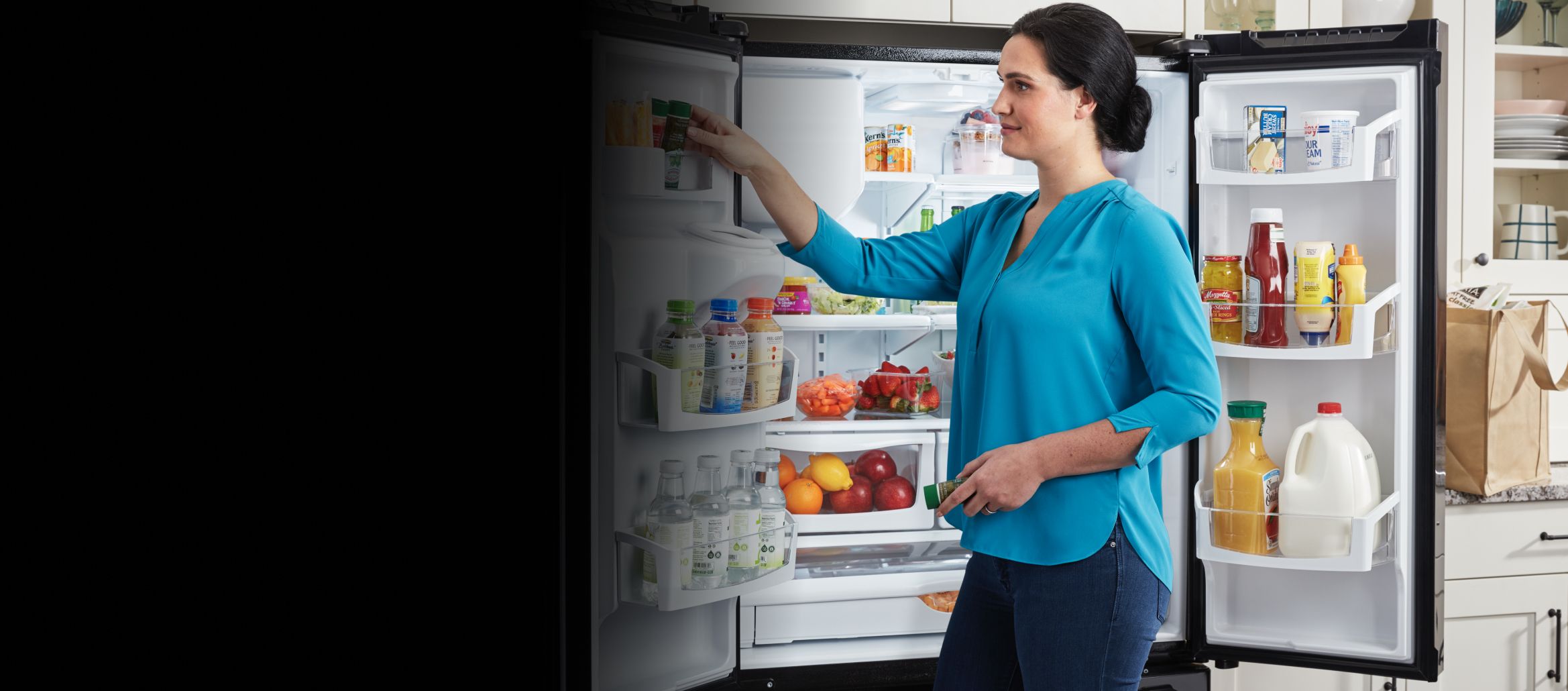 An open Maytag® refrigerator.
