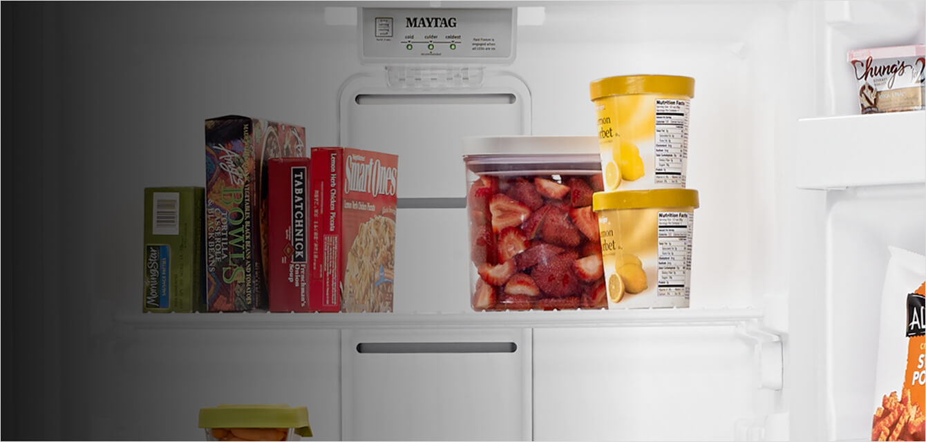 A closeup of the FastFreeze option on a Maytag® freezer.