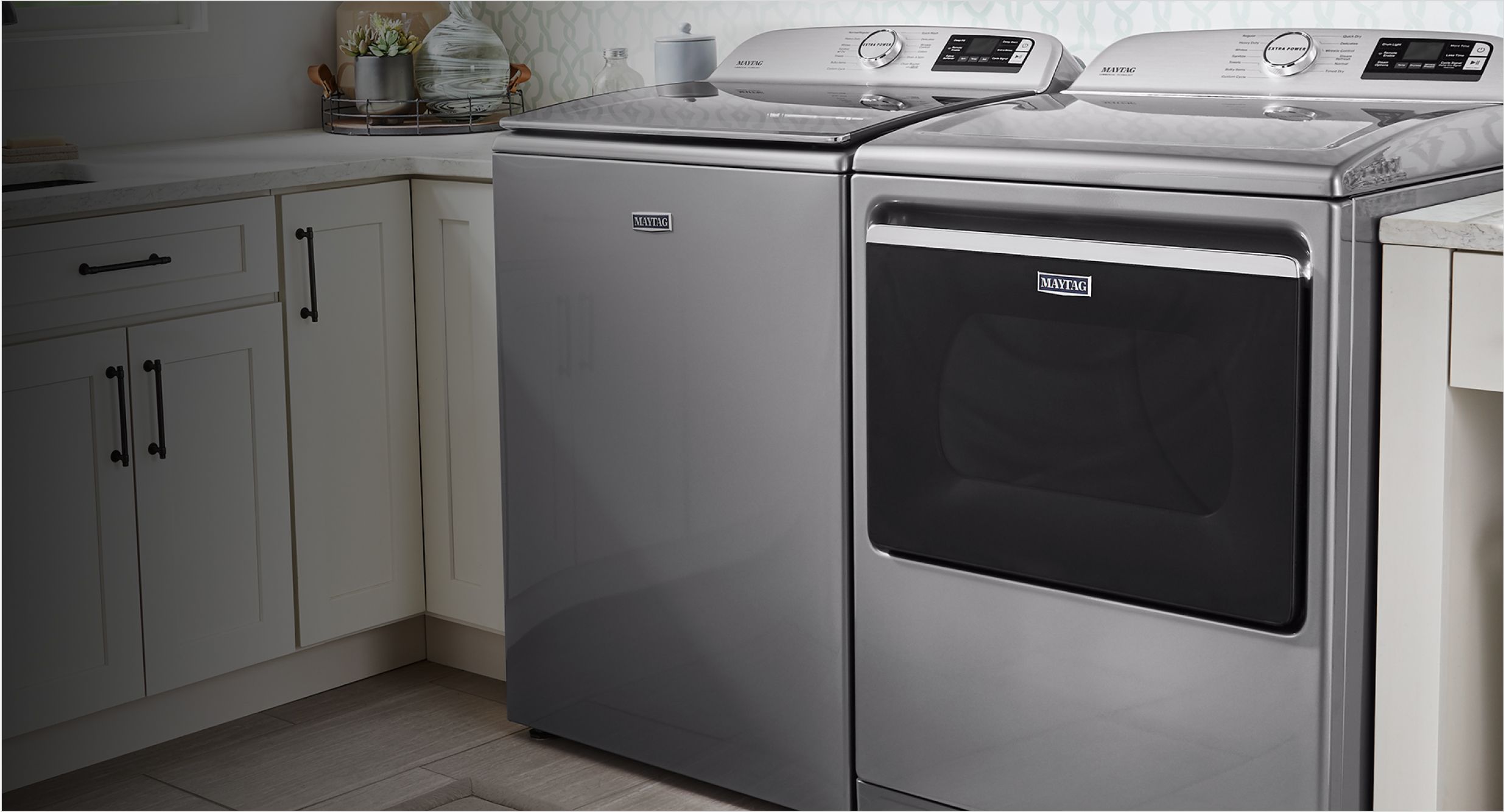Blue clothes soaking in a Maytag® washer.