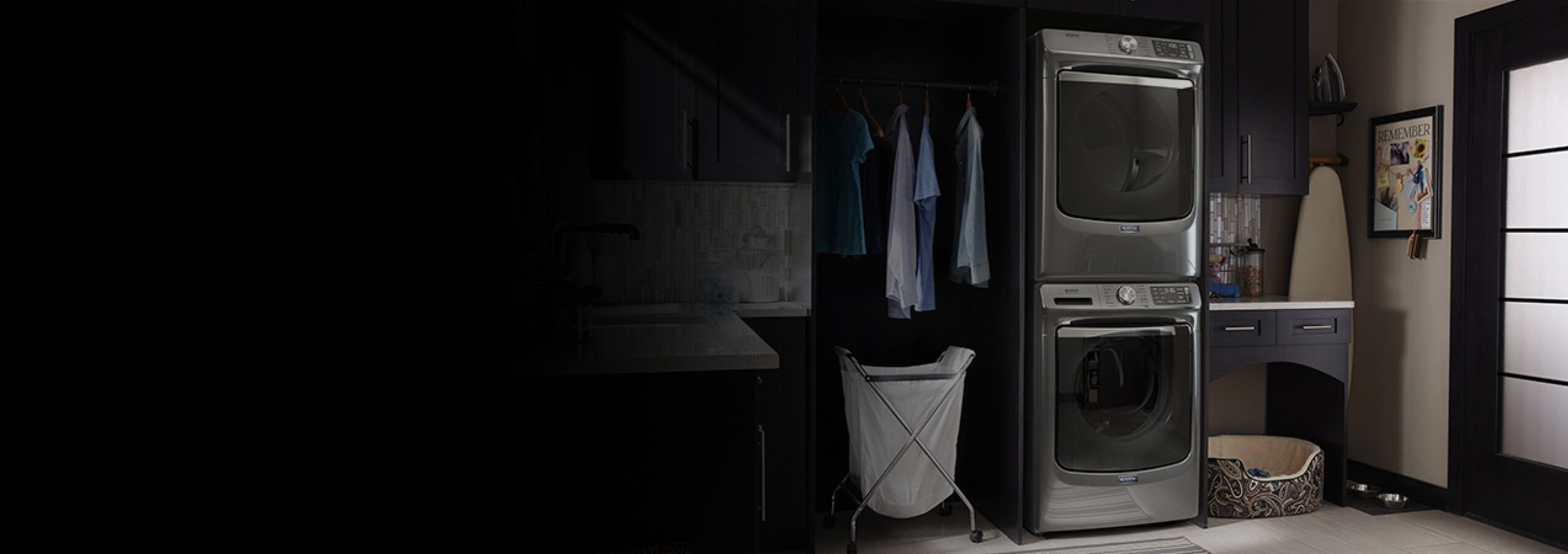 A laundry room with a Maytag® stackable washer and dryer set.