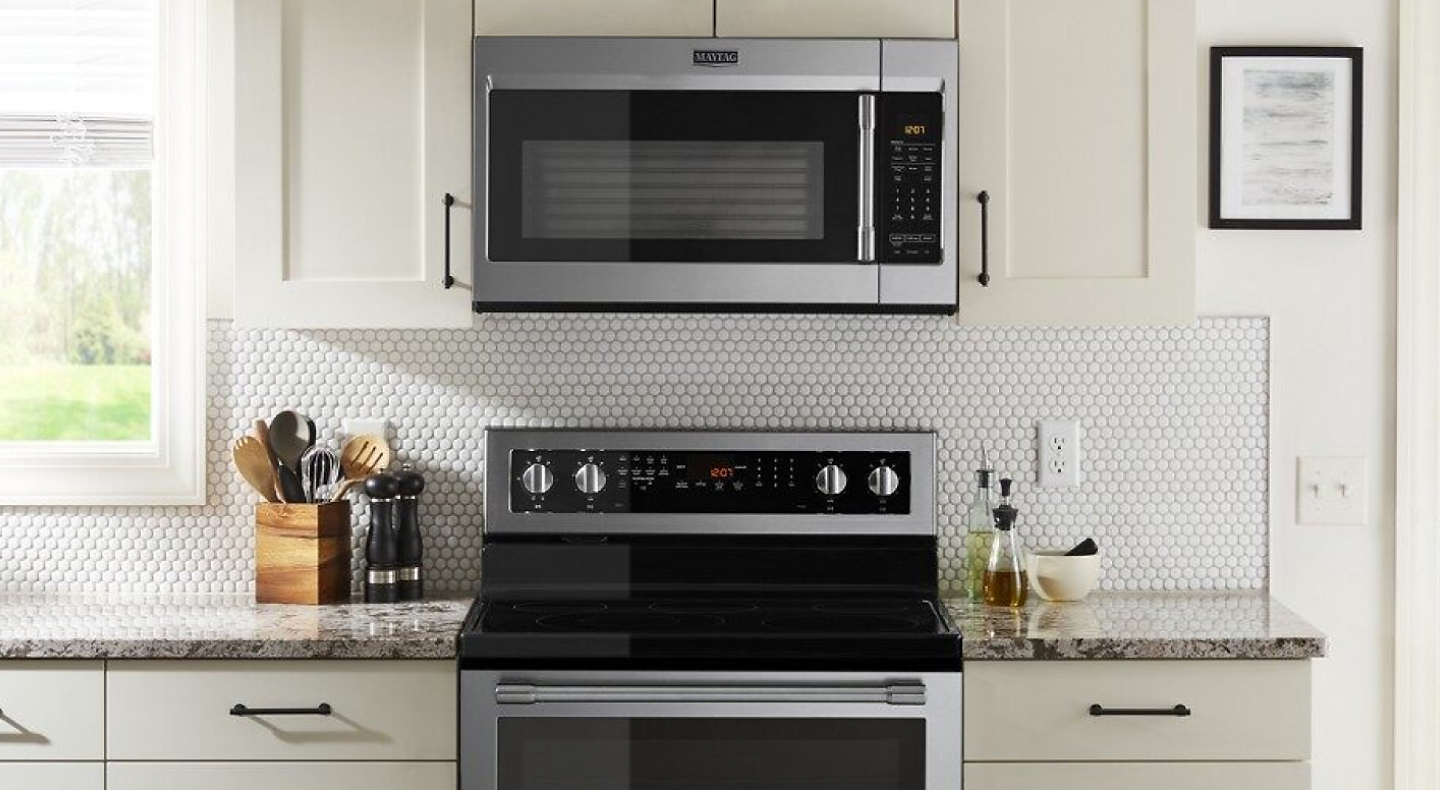 An over-the-range Maytag® microwave and oven in a modern kitchen.