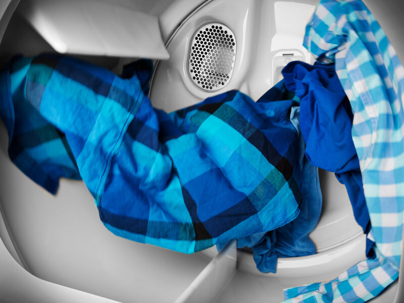 Laundry tumbling in a wrinkle reducing dryer