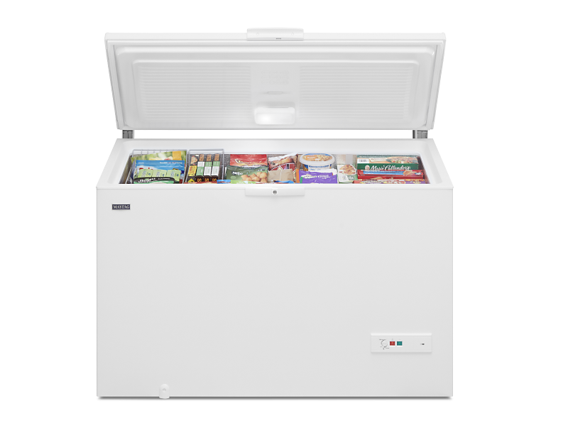 An opened white Maytag® chest freezer. An opened white Maytag® chest freezer.